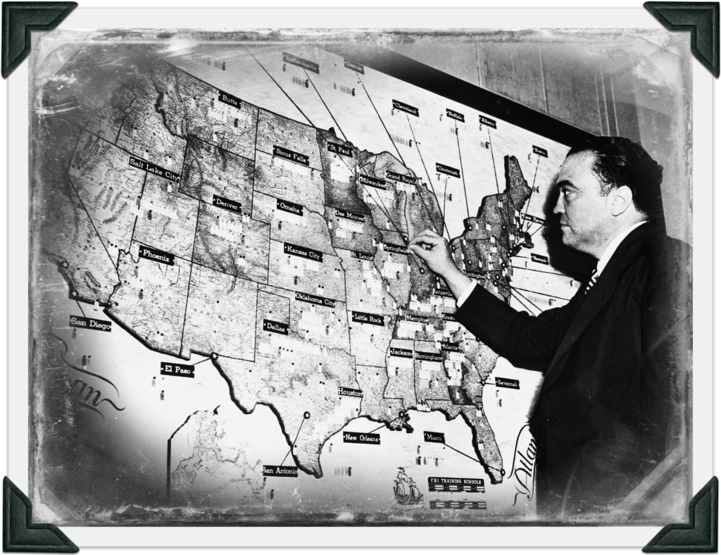 "There is no Mafia". Hoover standing in-front of US map.